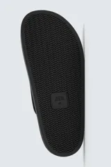 Zueco de cuero color negro con acabado serraje, plantilla acolchada, horma redonda y suela con volumen.