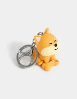 Llavero de silicona con forma de perro Shiba Inu color naranja.