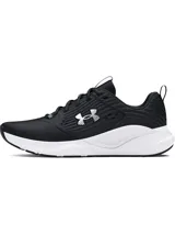 Championes de entrenamiento Under Armour Charged Commit TR 4, color negro con logo blanco y suela blanca.