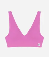 Soutien top color rosado con textura acanalada, copas desmontables y sin costuras.