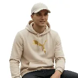 Gorro de béisbol color crema con visera curva y logo de Puma bordado en blanco en el frente.