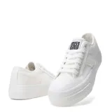 Championes de lona blancos con plataforma.