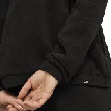 Campera de micropolar negro con cierre frontal, cuello alto y logo de Puma bordado en el pecho.
