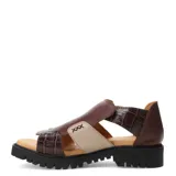 Sandalias de cuero combinadas en color negro y beige, con diseño de tiras cruzadas y suela track.