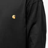 Camiseta de manga larga de algodón negro con cuello redondo y logo bordado.