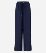 Pantalón de playa confeccionado en viscolino azul marino con lazo en la cintura y bies contrastante blanco en los laterales.