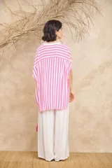 Pantalón palazzo blanco de talle único, con cintura elástica y bolsillos laterales.