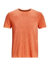Remera deportiva gris jaspeado de corte clásico, con cuello redondo y mangas cortas. Confeccionada con tejido de punto transpirable y tecnología seamless para mayor comodidad.