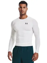 Remera blanca de manga larga Under Armour HeatGear Armour, ajustada al cuerpo, con logo en el pecho y tecnología HeatGear para mantenerte fresco y seco.