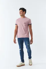 Pantalón de jean skinny azul oscuro con roturas y tiro medio.