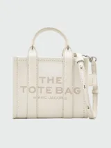 Bolso de cuero color verde militar con asa corta y correa ajustable, diseño práctico y elegantemente minimalista.