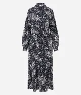 Vestido largo tipo chemise confeccionado en viscolino con estampado floral. Tiene cuello de camisa, mangas largas, abotonadura frontal y lazo en la cintura.