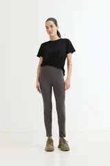 Calza legging gris oscuro de algodón con cintura alta.
