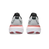 Championes de running Asics Gel-Nimbus 25, color blanco con detalles en negro, rojo y celeste.