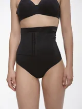 Colaless de microfibra color beige, con cintura alta y corte clásico.