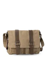Morral marrón de tela canvas con diseño vintage, tapa frontal y dos correas ajustables de símil cuero. Incluye múltiples compartimientos y correa ajustable para el hombro.
