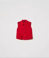 Camisa cropped sin mangas de algodón elástico con motivo de pliegues con efecto plisado, cierre con botones en tono a juego y corte recto.