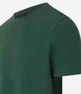 Remera verde oscuro de corte slim, cuello redondo y manga corta. Confeccionada en algodón texturizado.