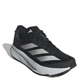 Championes deportivos color negro con detalles plateados y gris, diseño ligero y transpirable.