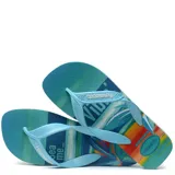 Sandalias Havaianas modelo Surf, con base estampada con diseño de playa y tiras negras.