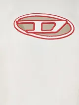 Camiseta oversize blanca de algodón orgánico con logo Diesel ovalado cortado a láser y bordado en el pecho.