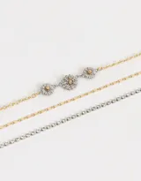 Collar corto multicadena con strass, eslabones y margaritas de metal.