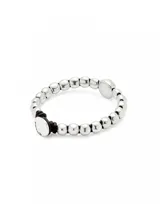 Pulsera de cuentas de aleación de metales bañadas en plata de ley con una cuenta central mayor.