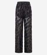 Pantalón pantalona de fiesta con cintura elástica y forro de short. Confeccionado en lentejuelas metalizadas con diseño geométrico.