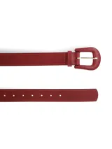 Cinturón de cuero con estampado de vaca y hebilla forrada en cuero.