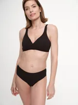Soutien tipo bralette color beige, sin aro ni relleno, de algodón.