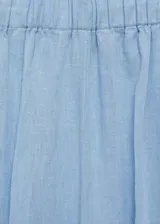 Pantalón culotte color beige de lino y viscosa, con cintura elástica y corte ancho.