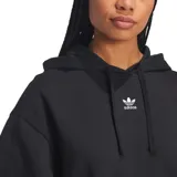Buzo hoodie Adidas Essentials Oversized Fleece de mujer, color negro con logo Adidas bordado en blanco en el pecho.