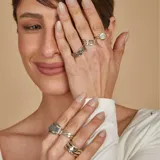 Anillo de plata 925 con apliques de oro 9k, diseño entrelazado.