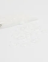 Set de 120 gomitas de pelo elásticas de silicona color negro, contenidas en una bolsita transparente con cierre y llavero de cadena metálica.