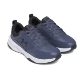 Championes Under Armour Charged Edge para hombre, color negro con detalles en verde flúor y suela blanca. Ideales para entrenamiento en gimnasio o al aire libre.