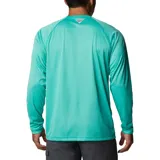 Remera de manga larga Columbia Terminal Tackle Heat, color gris jaspeado, con logo de la marca en el pecho y en la manga. Confeccionada en tejido transpirable de secado rápido y protección solar UPF 50.