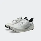 Championes de running Altra Experience Flow, color blanco con detalles en negro. Presentan malla técnica bicolor, drop bajo de 4 mm y entresuela de espuma ligera moldeada por compresión. Cuentan con ajuste FootShape característico de Altra.