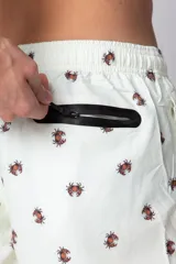 Short de baño blanco con estampado de cangrejos marrones, cintura elástica con cordón de ajuste y bolsillos laterales.