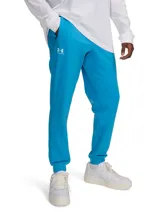 Pantalón de jogging Under Armour para hombre, color celeste, de corte ajustado, con cintura elástica y bolsillos laterales con cierre. Presenta el logo de la marca estampado en la pierna izquierda.