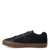 Championes Converse Sport Casual OX negros con suela marrón de goma.