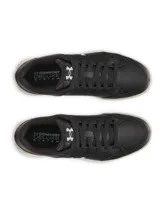 Championes Under Armour para mujer, color negro con logo celeste en el lateral y suela color crema. Calzado ligero, transpirable y cómodo para uso diario.