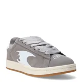 Championes urbanos negros con suela color crema y logo blanco en el lateral.