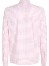 Camisa de algodón Oxford con motivo de cuadros Vichy rosas y blancos, corte regular, cuello con botones, puños con botones y logo de Tommy Hilfiger bordado en el pecho.