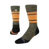Medias altas de diseño camuflado en tonos verdes y naranjas, con refuerzo en la parte inferior.