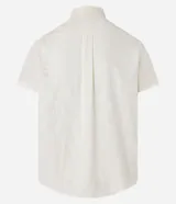 Camisa de manga corta color crema, confeccionada en viscosa con textura de rombos.