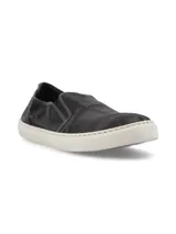 Zapatillas slip-on azules de algodón orgánico con suela de caucho natural.