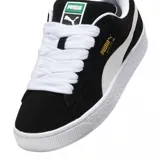 Championes Puma Suede XL, color azul con franja lateral blanca y detalles dorados.