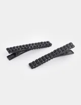 Set de dos hebillas para el pelo tipo pico de cigüeña, color negro, con aplique de mini tachas.