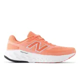 Championes New Balance Evoz V4 para dama, color salmón con detalles en plateado y blanco.