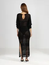 Sweater tejido en jersey con lurex, escote bote y detalle de tigre insignia de Polonio en la espalda.